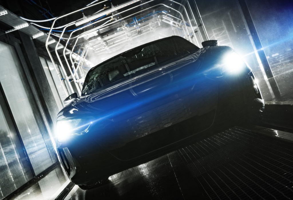 futuristic vehicle inside a touchless car wash 2022 12 16 11 53 23 utc 1